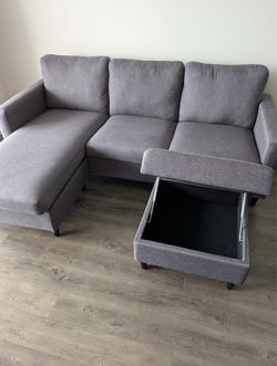 Free sofa and storage ottoman.