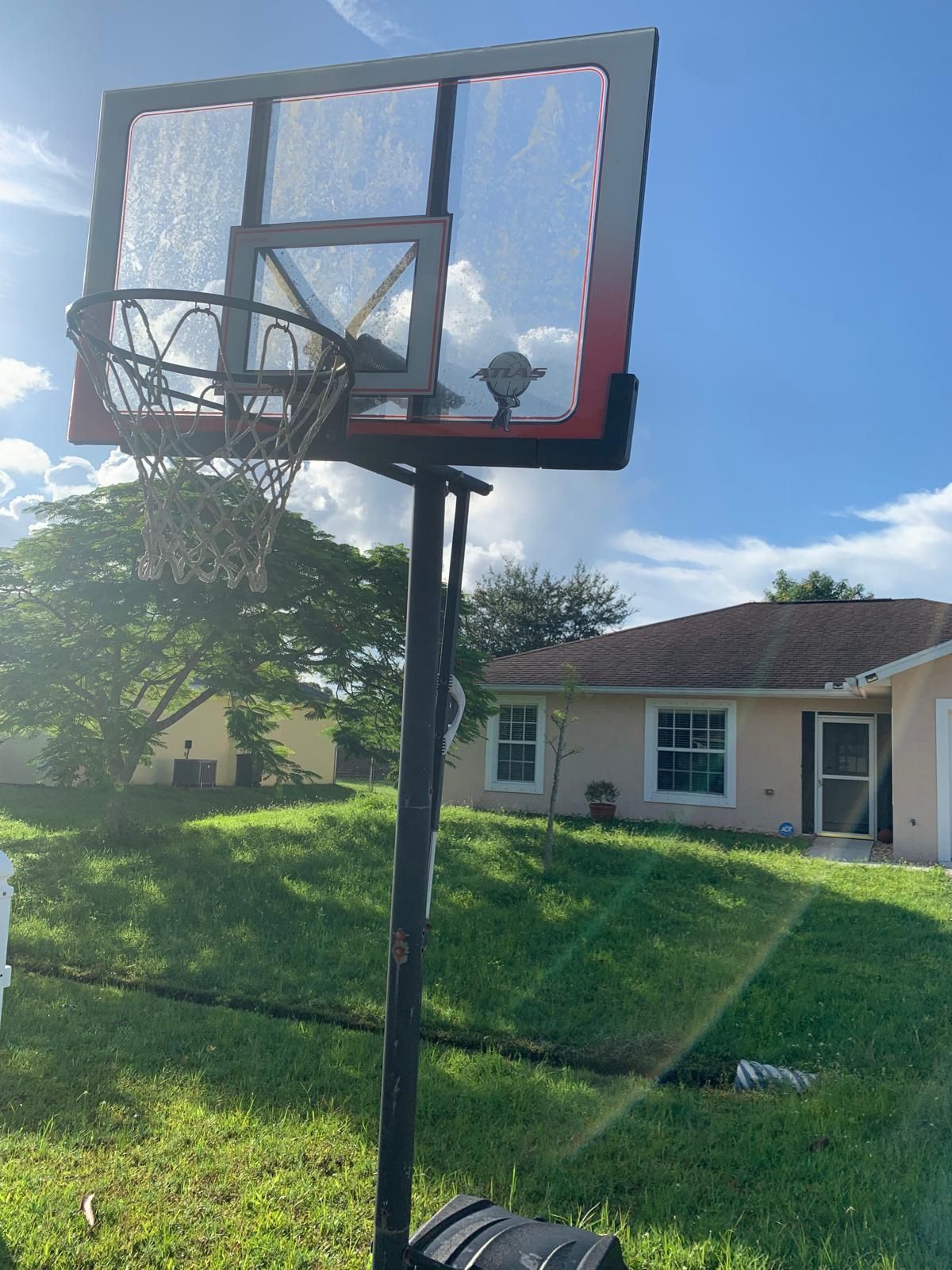 Atlas 52 Inch Adjustable Basketball Hoop And Stand