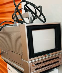 vintage Contec KRB-1541 5-inch portable color television with a built-in AM/FM radio