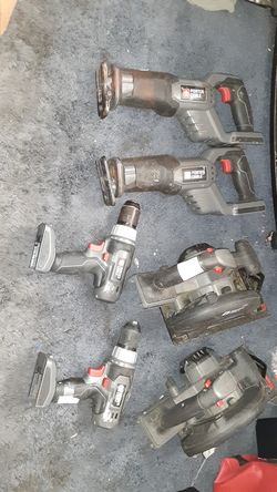 Cordless porter cable drill sawzall and circular saw and charger and four batteries that won't charge
