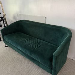 Green velvet sofa