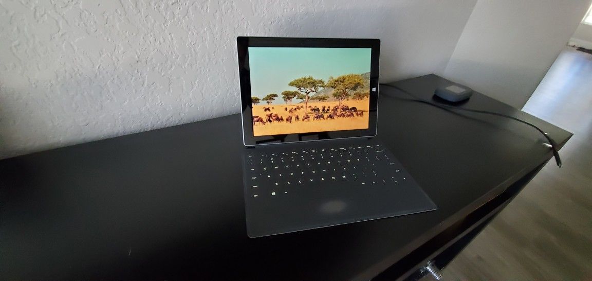 Surface with backlit keyboard Has Adapter And Ready To Go