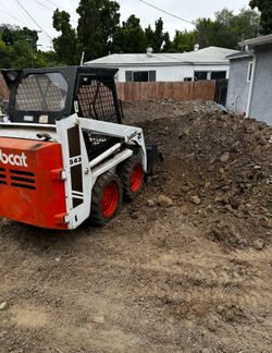 Bobcat With 0 P £ R A T O R 