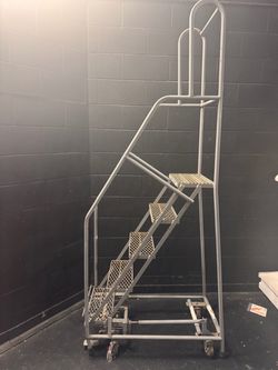 Metal rolling ladder