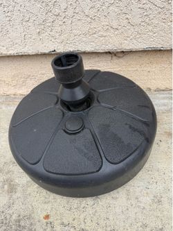 Umbrella stand. Never used.