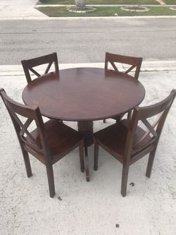 Wooden table with complete set of 4 chairs