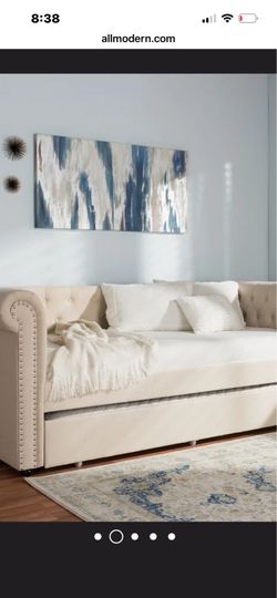 Upholstered tufted trundle bed