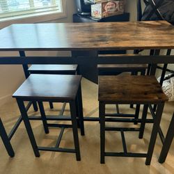  Counter Height Table and Four Matching Stools