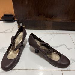  Title: Lower East Side Brown Mary Jane Heels (Size 7W)  Description: Step into classic elegance with these timeless Mary Jane heels from Lower East S