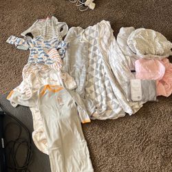 Newborn baby lot. Nightgowns, sleep sacks, bassinet sheets.