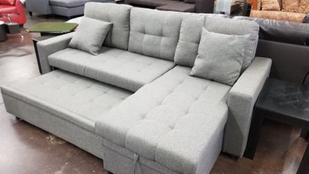 Reversible Sofa chaise sectional with a pullout bec