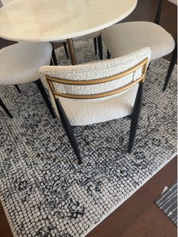 Marble table with 4 chairs.