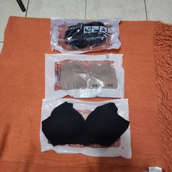 3 bras  two black, & one beige