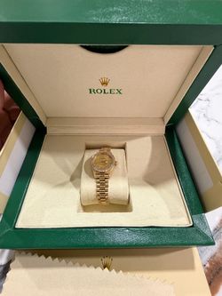 Women’s Rolex presidential with diamonds