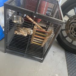 TRAVELING CAGE