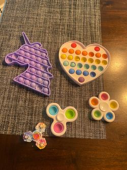 Lot of 5 pop its toys
