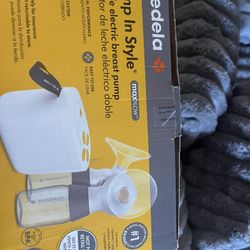 New 2nd Gen Medela Pump in Style Pro Breast Pump, Clinically Proven Hospital-Efficiency, Compact Portable Double Electric Pump with Bottles and Person