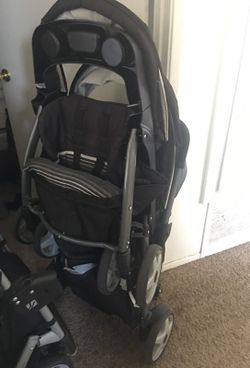 Double sit and stand stroller