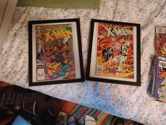 The uncanny x men bundle twelve plus two framed all in sleeves and two in picture frames