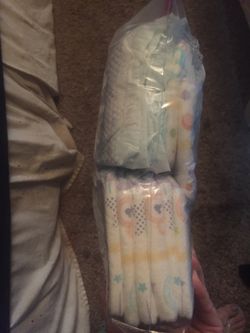 12 Huggies diapers Sz 6