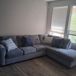 Gray L shape couch.