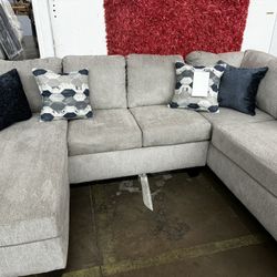 Brand New Gray Sectional With Accent Pillows