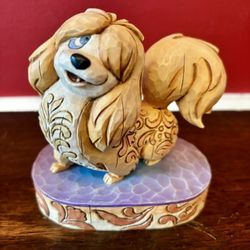 Jim Shore Disney Flirtatious Peg” from Walt Disney’s Lady and The Tramp. Walt Disney Figurine Collection