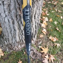 LOUISVILLE SLUGGER 33 INCH FASTPITCH SOFTBALL BAT. FIRM PRICE LOCATED IN GLENDORA 