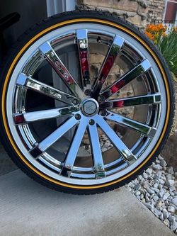 24" Chrome wheels & Vogue tires
