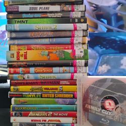 Stack Of DVDs Plus 1 Blu-ray 