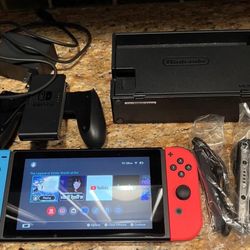 Nintendo Switch with Neon Blue and Neon Red Joy-Con