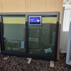Brand New 61W x 45.25H PGT Impact Aluminum Sliding Window.