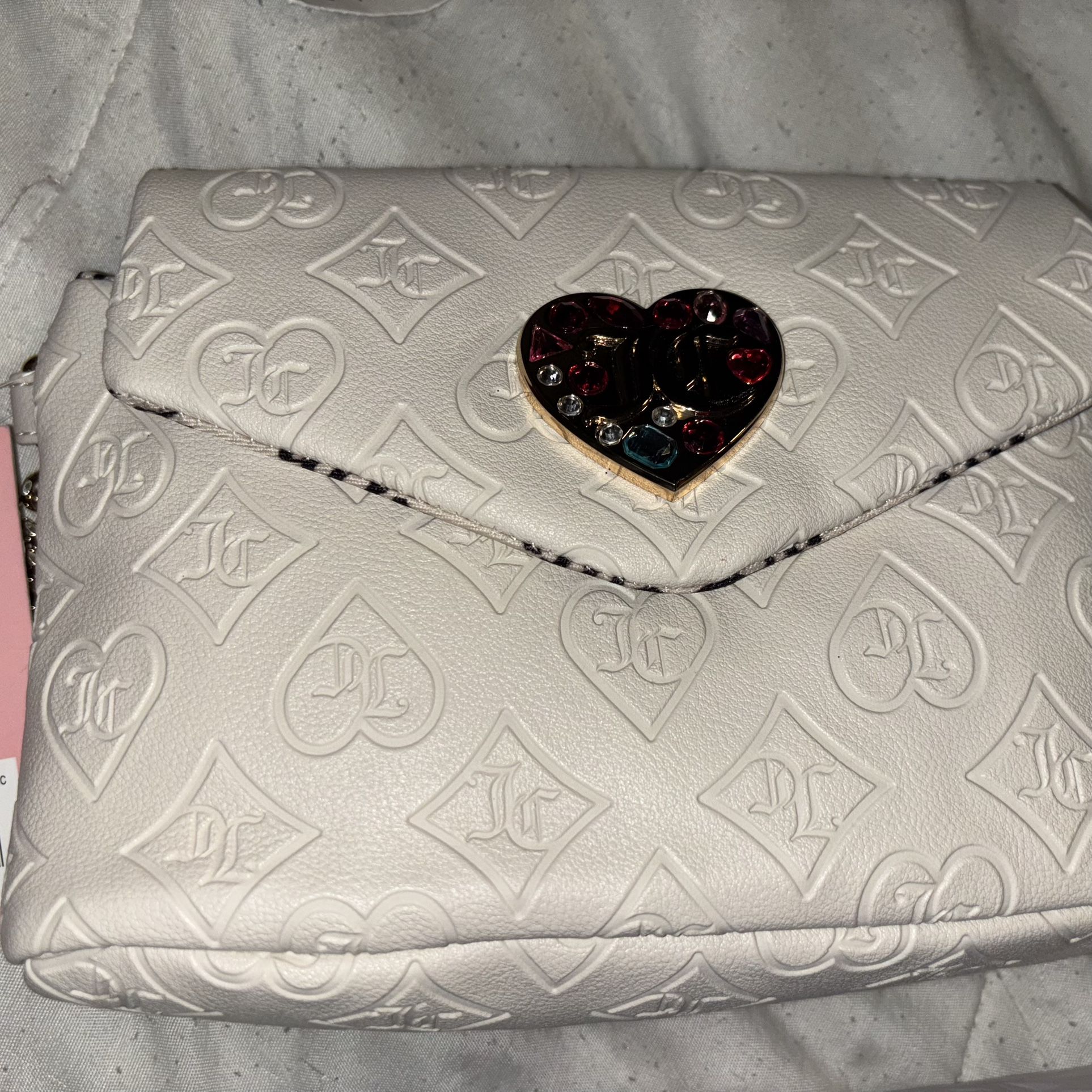 Juicy couture Glitzed out Mini Wristlet With Pull out
