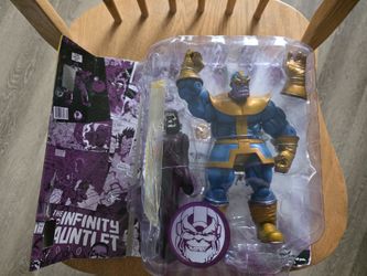 The Infinity Gauntlet Thanos with Death Figurine