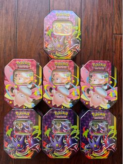 Pokemon TCG Mega Moonlit Tins - 7x