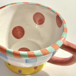 Hand-painted ceramic mug. Whimsical, colorful design w/ Red Polka-dots inside.