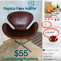 $55 LumiSource Accent Swivel chair Mid century style swan chair Replica Faux leather some scratches