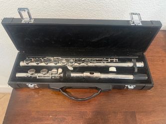 Silver flute with case