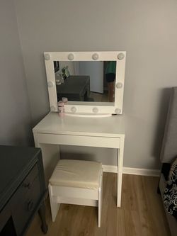 Modern Vanity including like new Chair ( However Lighst does not turn on)