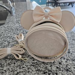 LOUNGEFLY LIGHT PINK CROSSBODY/MINI BACKPACK  WITH CLEAR FRONT COVER TO PUR YOUR PINS ON AND SHOW/PROTECT