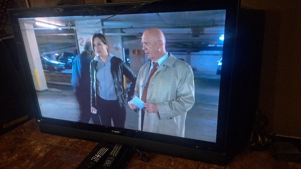 50 In Sharp TV And DVD Player Both Have Remotes