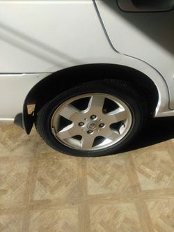 ISO looking for a Sentra 2005 wheel 6 spoke silver my rim I'm looking for one