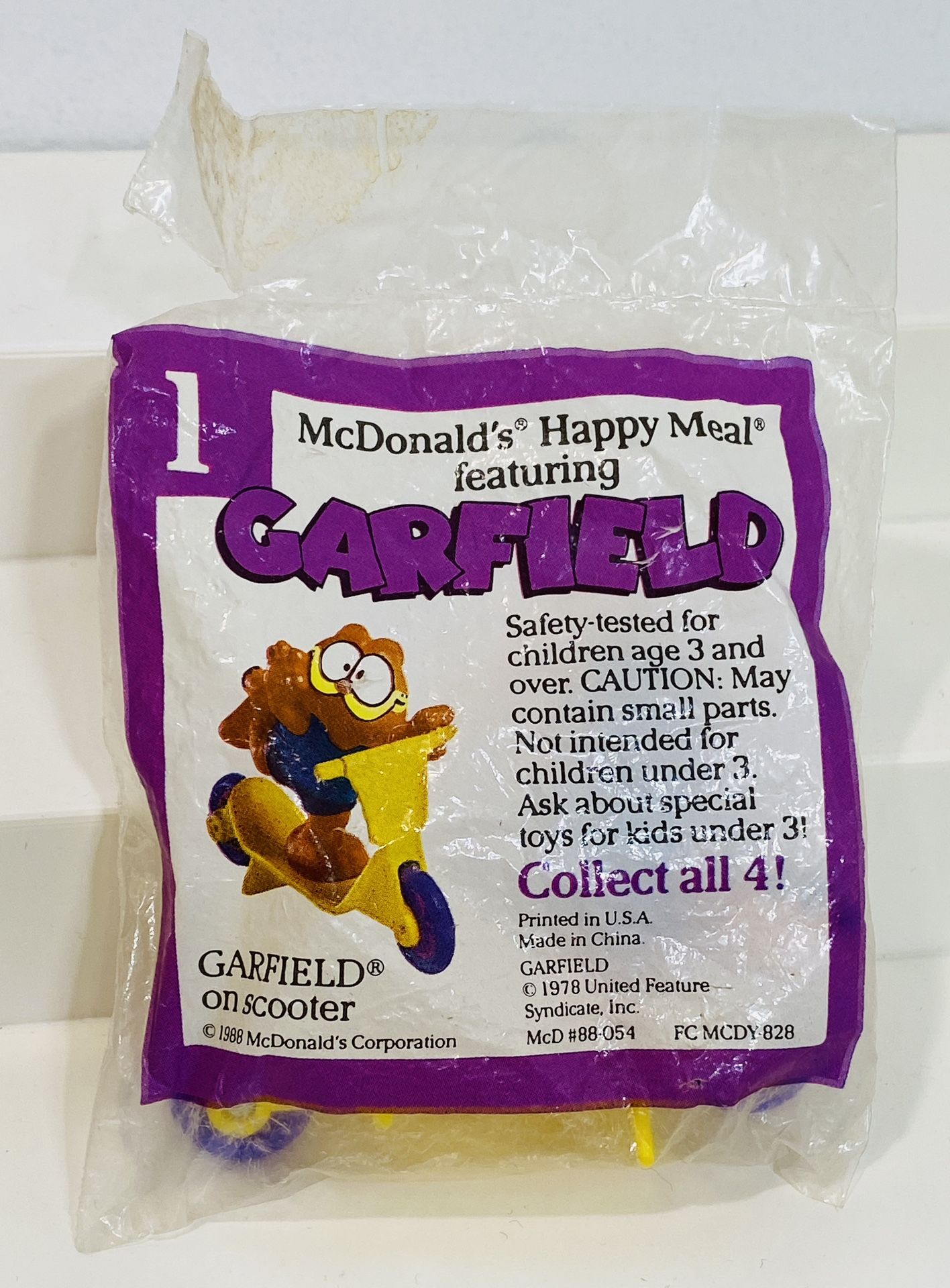 NEW VNTG McDonald’s 1988 Garfield on Scooter #1 Happy Meal Toy Orig Sealed Bag