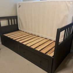 IKEA day bed turns into king bed.