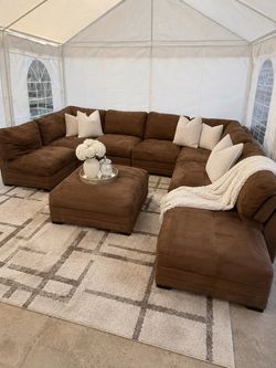 Large Brown Sectional Sofa with Ottoman