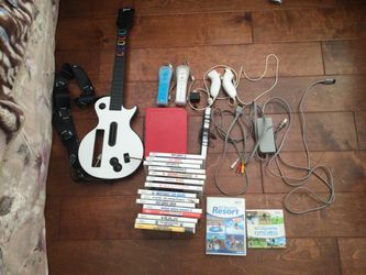 Red Nintendo Wii Bundle with 17 Games & Guitar