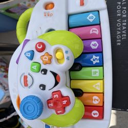 Bundle fisher price piano and joystick
