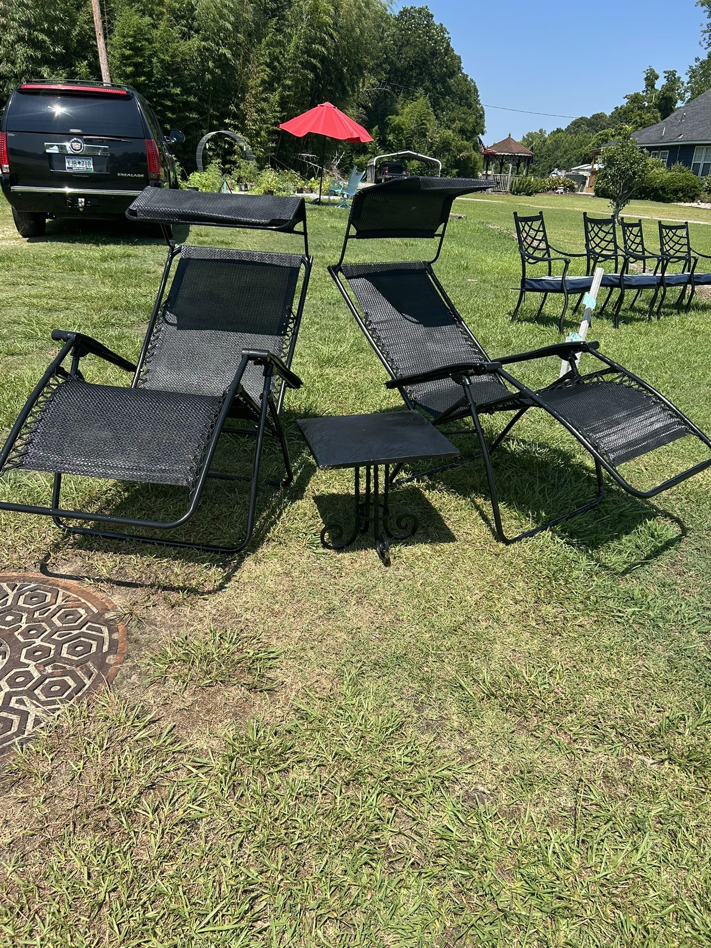 Two lounger chairs with table