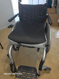 Quickie Nitrum Manual Wheelchair with Cushion and Footrest