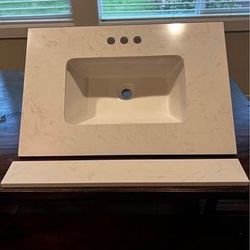 NEW - White Marble Quartz Countertop with white ceramic sink and backsplash